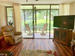 View from your fully stocked kitchen to the screened in lanai